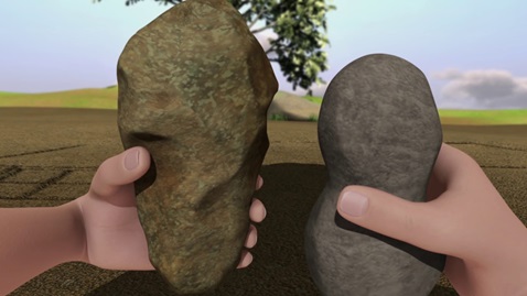 hands holding stones