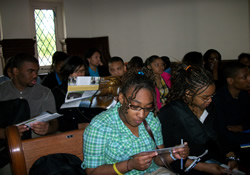 Students review brochures and other information during one of 11 campus visits they make during Hope United Methodist Church's 'Black College Tour.'