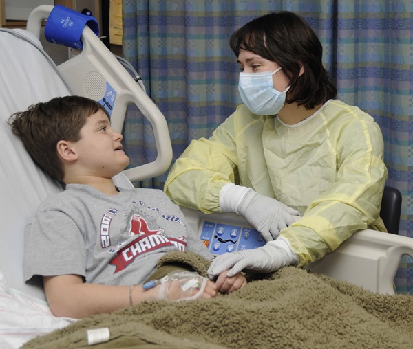 fea_1617_3233_annbaxterhaywardgeneralhospital The Rev. Ann Baxter-Hayward is on the chaplaincy staff serving patients, families and staff at Boston Children's Hospital. GBHEM-UMEA file photo.