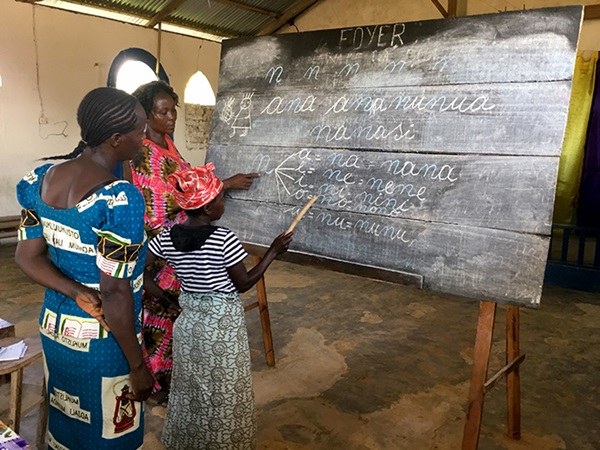 congo-pastor-wives-chalkboard-child-2018-690