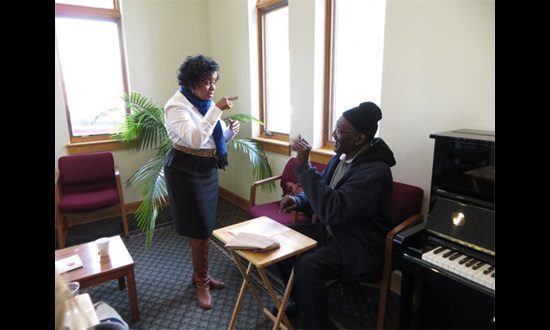Sarah Whittle (Sign Language interpreter) and Edward Wiggins (Deaf client) at Grace UMC’s Deaf Tax Day, Wilmington, Delaware. 