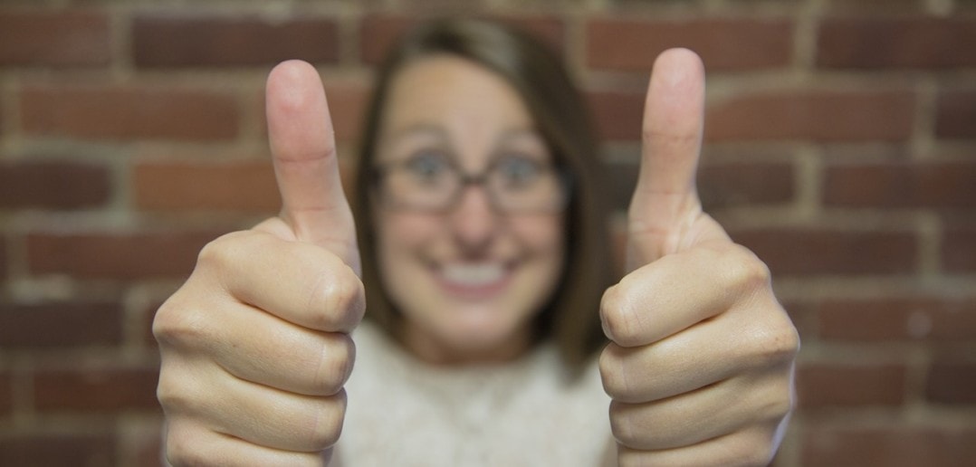 girl giving thumbs up