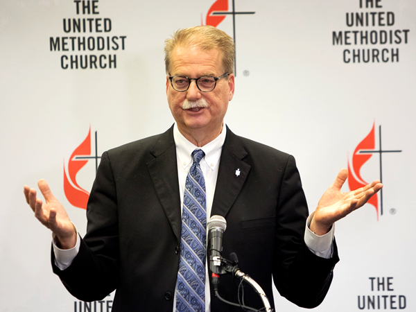 Bishop Kenneth Carter speaks at a press conference. Photo by Kathleen Barry, UMNews.