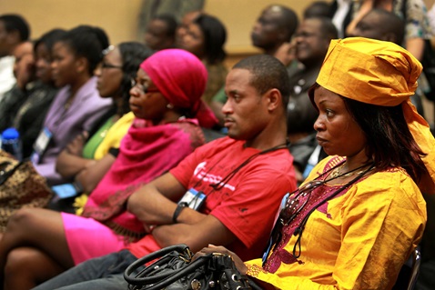 Interpreters meet during the 2012 United Methodist General Conference held in Tampa, Fla. In the foreground is Sarah Bimpa, a member of the language interpretation team in Swahili. A UMNS photo by Kathleen Barry.