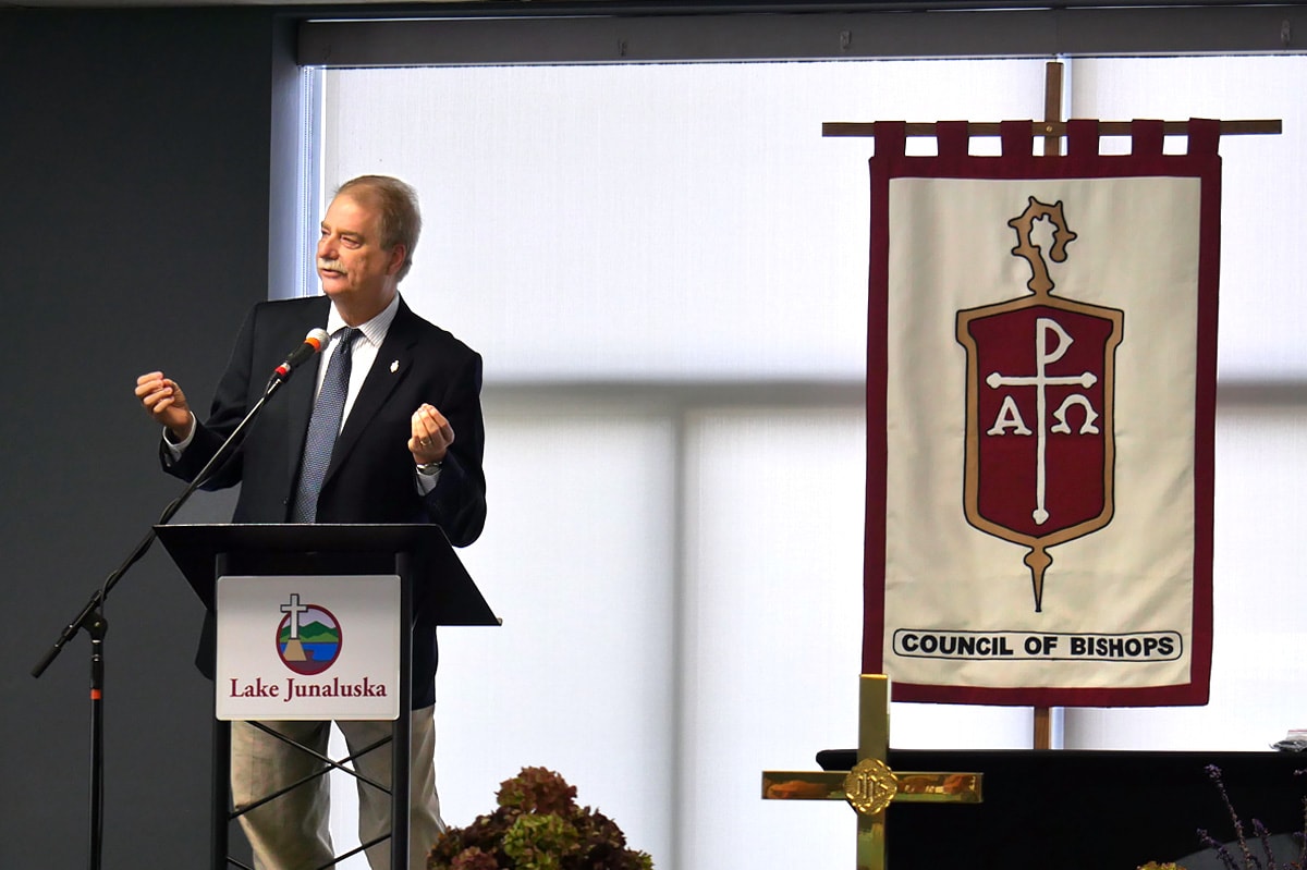 Bishop Kenneth H. Carter, president of the Council of Bishops, discusses the strained United Methodist connection in his presidential address at the bishops’ fall 2019 meeting in Lake Junaluska, N.C. He urged adopting a posture of convicted humility. Photo by Heather Hahn, UM News.