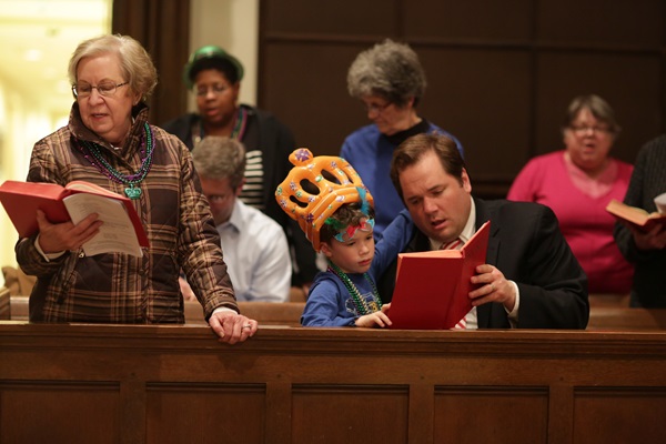 Congregants of West End United Methodist church join in singing from the hymnal during the Shrove Tuesday celebration held March 2, 2014 at West End United Methodist Church. Photo by Kathleen Barry, UMNS.