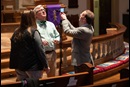 Volunteer Mike Graves (right) sets the camera to livestream a worship service from Belmont United Methodist Church in Nashville, Tenn. Helping prepare are Cindy Caldwell (left) and the Rev. Paul Purdue, Belmont’s senior pastor. Photo by Mike DuBose, UM News.