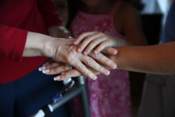 As physical touching is discouraged, churches are finding different ways to provide care and comfort to elderly members. Photo by Kathleen Barry, UM News.