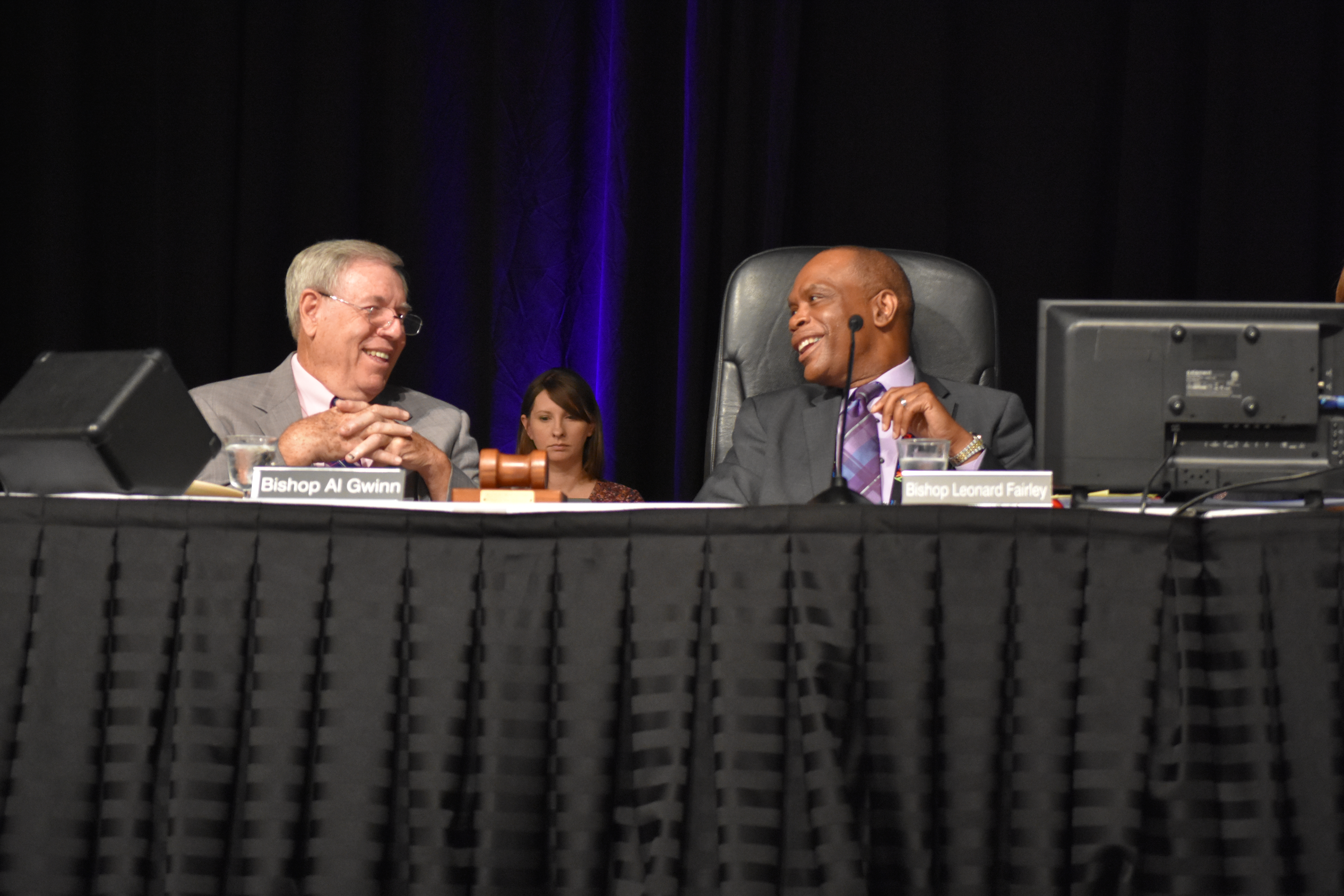 Kentucky Bishop Leonard Fairley and retired Bishop Al Gwinn share a laugh during the 2019 Kentucky Annual Conference. Fairley, president of the Southeastern Jurisdiction College of Bishops, and Gwinn were among the signatories of a June 5 pastoral letter from the College. Photo by Cathy Bruce, Kentucky Annual Conference.
