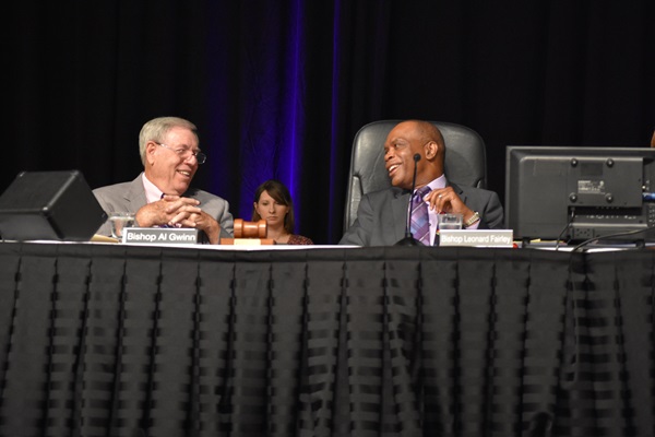 Kentucky Bishop Leonard Fairley and retired Bishop Al Gwinn share a laugh during the 2019 Kentucky Annual Conference. Fairley, president of the Southeastern Jurisdiction College of Bishops, and Gwinn were among the signatories of a June 5 pastoral letter from the College. Photo by Cathy Bruce, Kentucky Annual Conference.