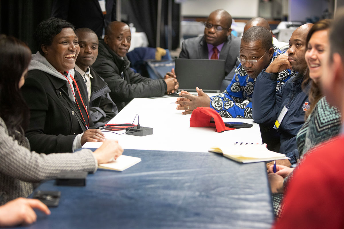 Zimbabwe communicator, Chenayi Kumuterera, shares smiles during a meeting of African communicators with the core team of United Methodist Communications during the 2019 United Methodist General Conference in St. Louis. (Photo by Kathleen Barry, UM News)
