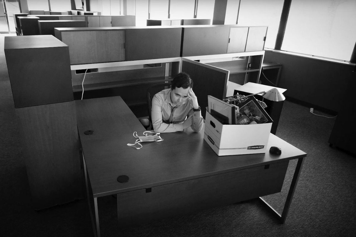 Paul Gomez protrayed a man dealing with the hash realities of the pandemic's toll on business in the empty desks of United Methodist Communications' previous side wing. (Photo by Mike DuBose) 