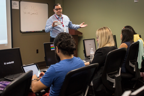 Communicators for the National Plan attend training at United Methodist Communications in Nashville, Tenn. Welcoming them is the Rev. Gustavo Vasquez, director of Hispanic/Latino Communications. Photo by Kathleen Barry, United Methodist Communications.