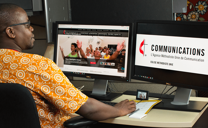 Isaac Broune, intern with the French Content Team at United Methodist Communications, works on the website of the French portal. Broune is a Vanderbilt University Divinity student from Côte d’Ivoire. Photo by Kathleen Barry, United Methodist News Service