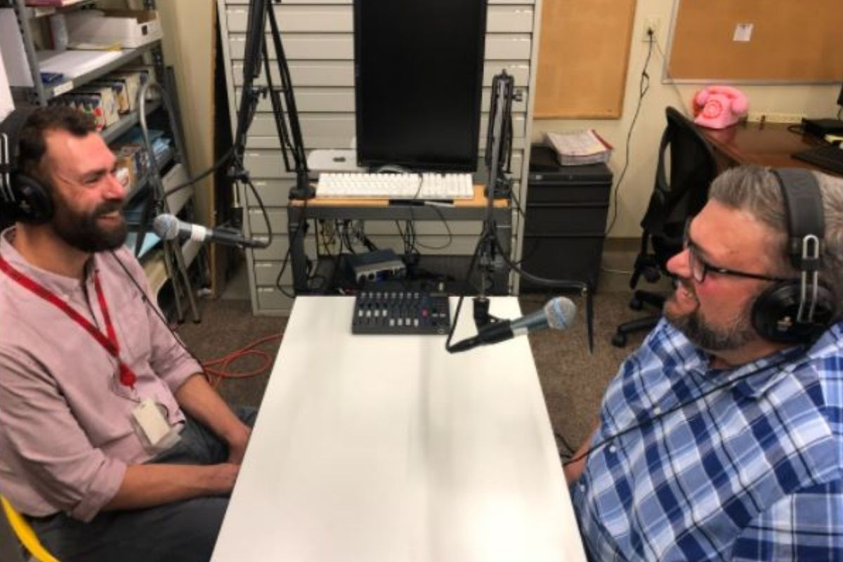 United Methodist Communications' Ryan Dunn and Joe Iovino discuss podcasting. (Photo by Crystal Caviness, United Methodist Communications.)