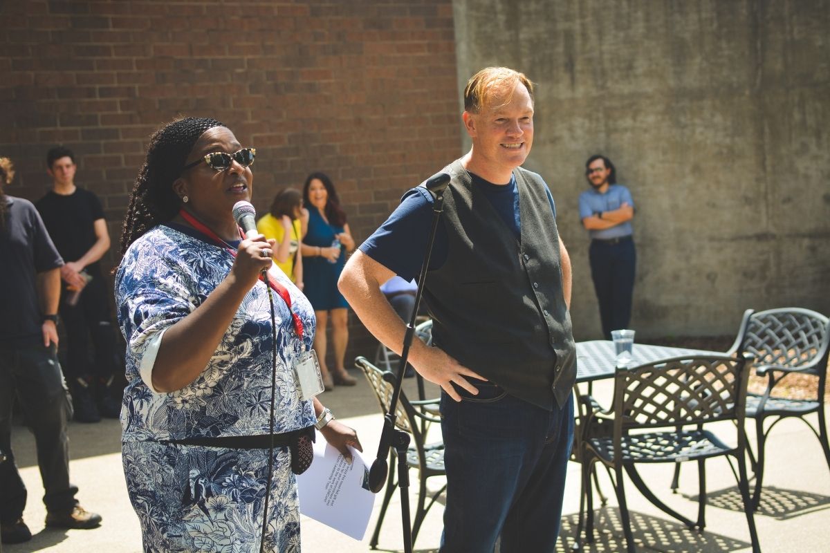Helen Allen and Dan Krause spoke to the staff during the United Methodist Communications picnic. (Photo by Aaron Crisler.)