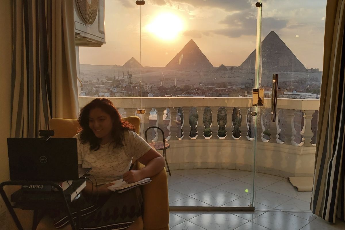 The strongest wifi signal spot happened to provide the best Zoom background of the Pyramids of Giza, Egypt. 