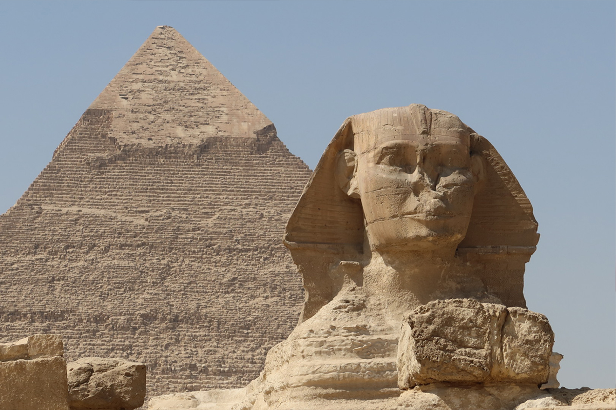 The second largest of the three Pyramids of Giza sitting behind the Sphinx in Giza, Egypt.