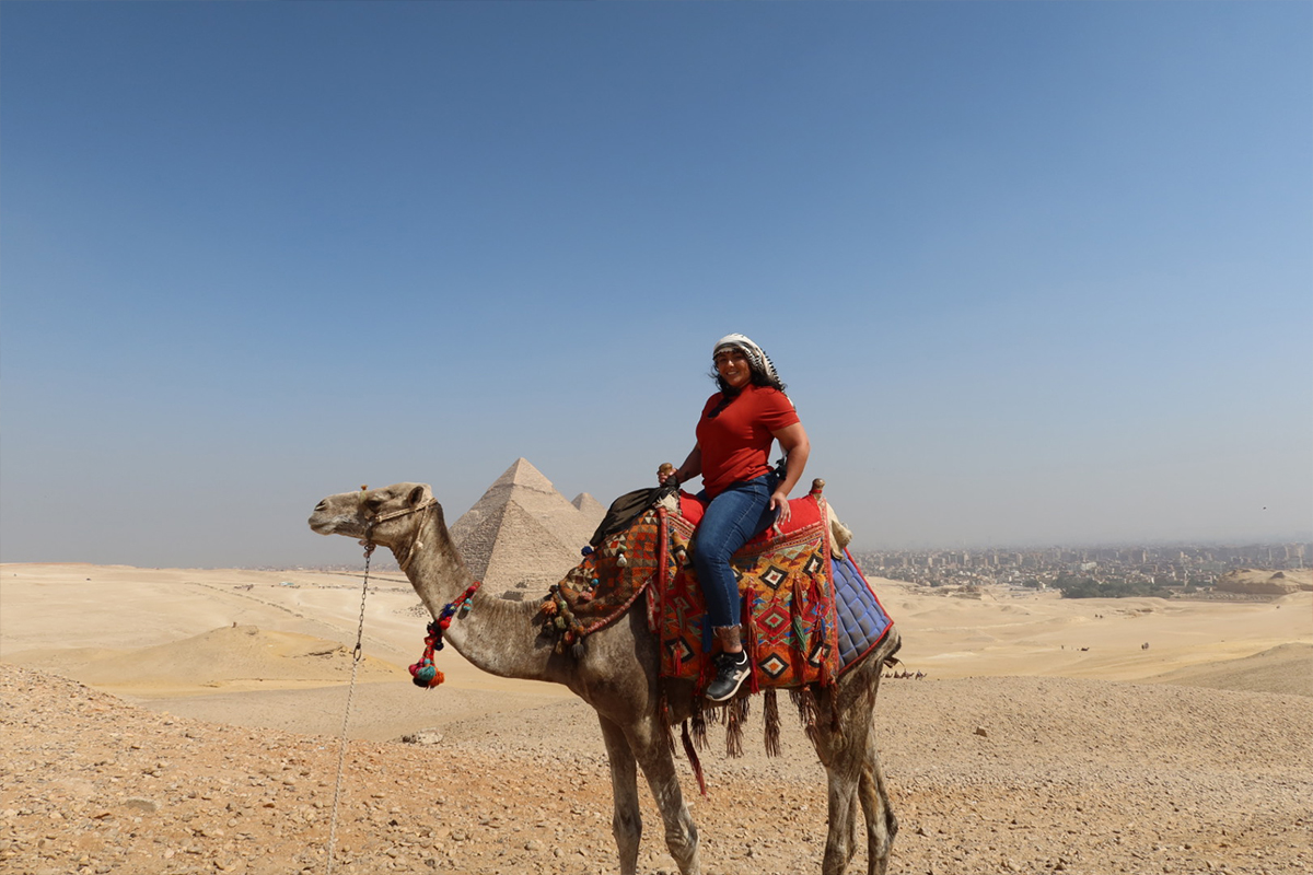 A camel ride up the plateau highlights the panoramic view of Giza and Cairo, Egypt.