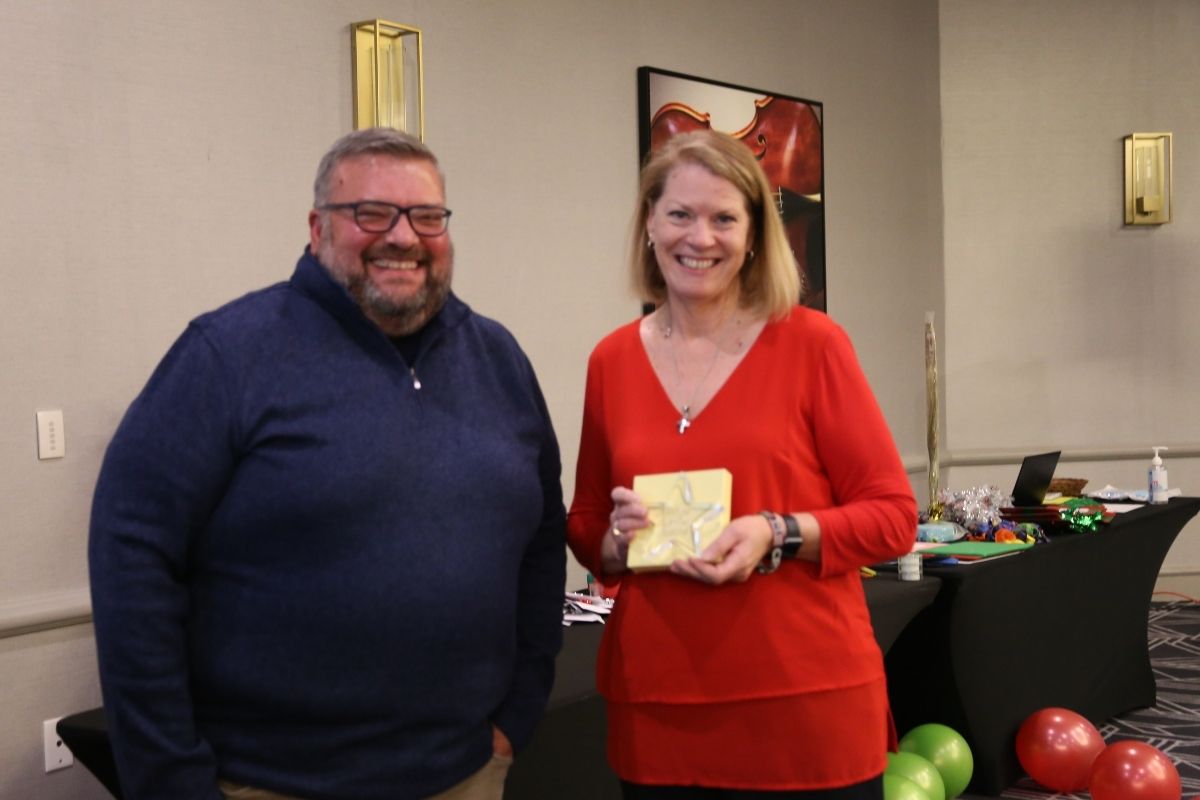 Joe Iovino was all smiles while presenting Crystal Caviness with a Star Award. Gustavo Vasquez (not pictured) received an Extra Mile Award.