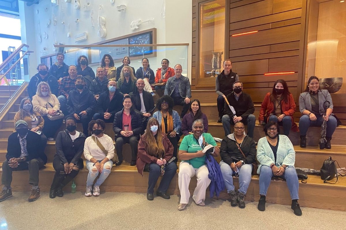 Staff gathered for an introduction prior to starting their museum visit. (Photo by Helen Allen.)