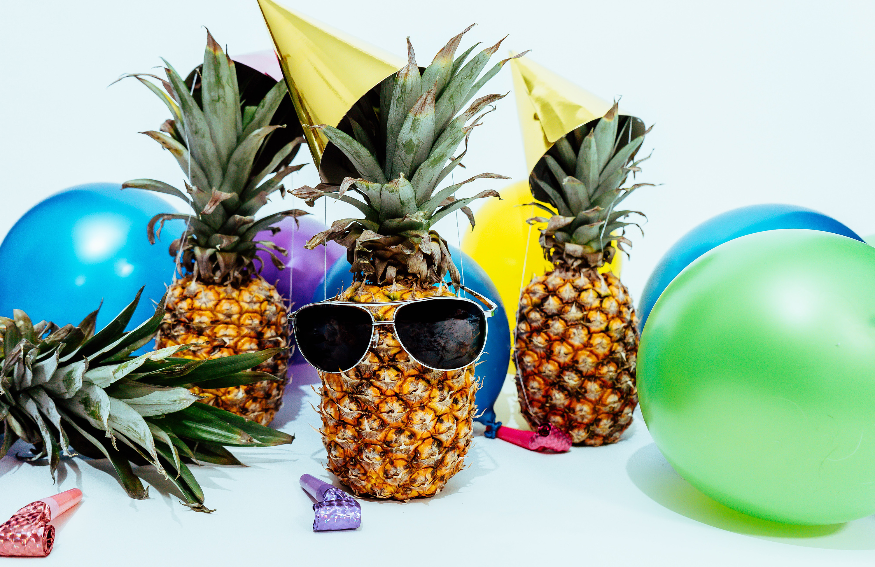 Whether we're in the season of New Year's resolutions or the thick of summer vacation time, you can boost your success by working common cultural events and activities into your messaging. Photo by Pineapple Supply Co. courtesy of Unsplash.