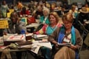 Delegate Tammy Estep from Virginia bows her head in prayer prior to the start of the Monday April 30 plenary at the 2012 United Methodist General Conference. Photo by Kathleen Barry, UMNS