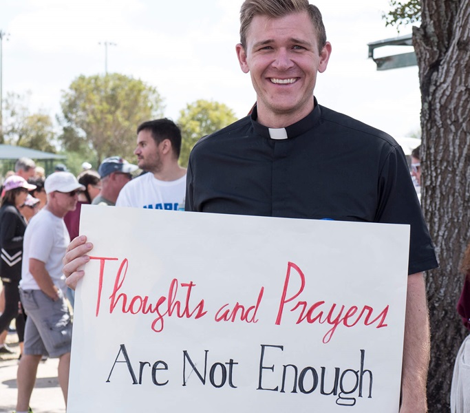 The Rev. Josh Beaty, pastor of discipleship at Christ United Methodist Church, Fort Lauderdale, Fla., was among many United Methodists who participated in the March for Our Lives rally held March 24 in Parkland, Fla. Photo by Kathy L. Gilbert, UMNS