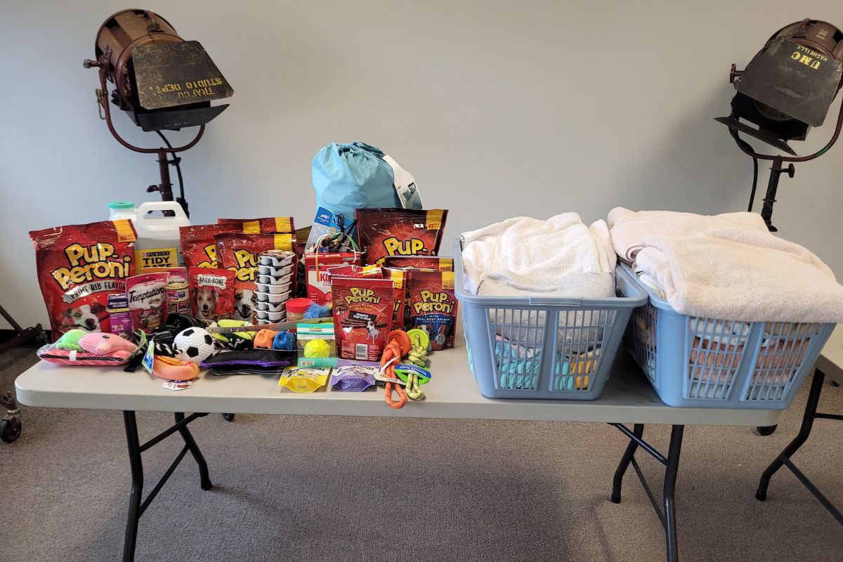 Thanks to the generosity of our staff, we had a full table's worth of donations for Metro Animal Care and Control. (Photo by Benda Smotherman.)