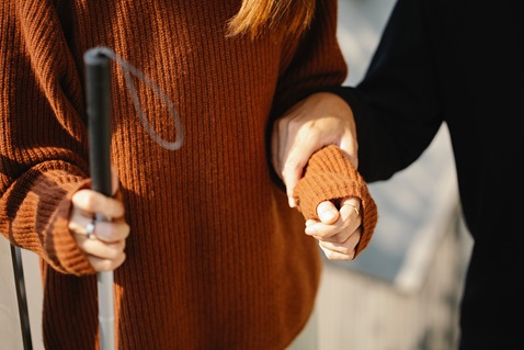 Find helpful advice for how to thoughtfully and considerately communicate and interact with people who have various types of disability. Photo by Eren Li, Pexels.com.