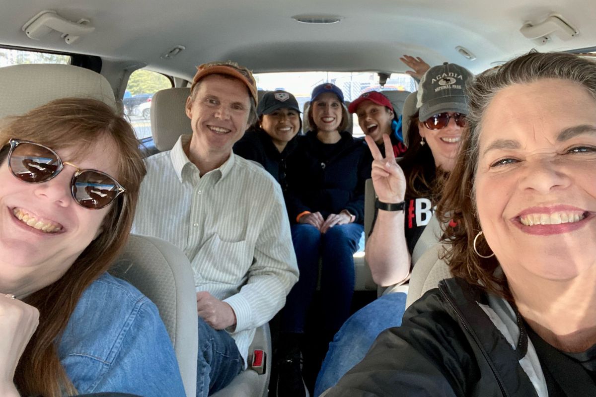 Staff members piled into the UMCom van to carpool to the game. Pictured (front L to R) Cindy Caldwell and Stacey Hagewood (middle L to R), Tim Tanton and Jennifer Rodia and (back L to R) Aileen Delgado, Brenda Smotherman and Lilla Marigza.