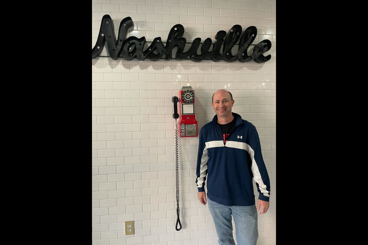 Remote team members even traveled into town to enjoy the festivities. Neil Grunstein took time to capture being in Nashville during a morning marketing meeting at a local Germantown coffee shop on game day. (Photo by Diane Degnan.)