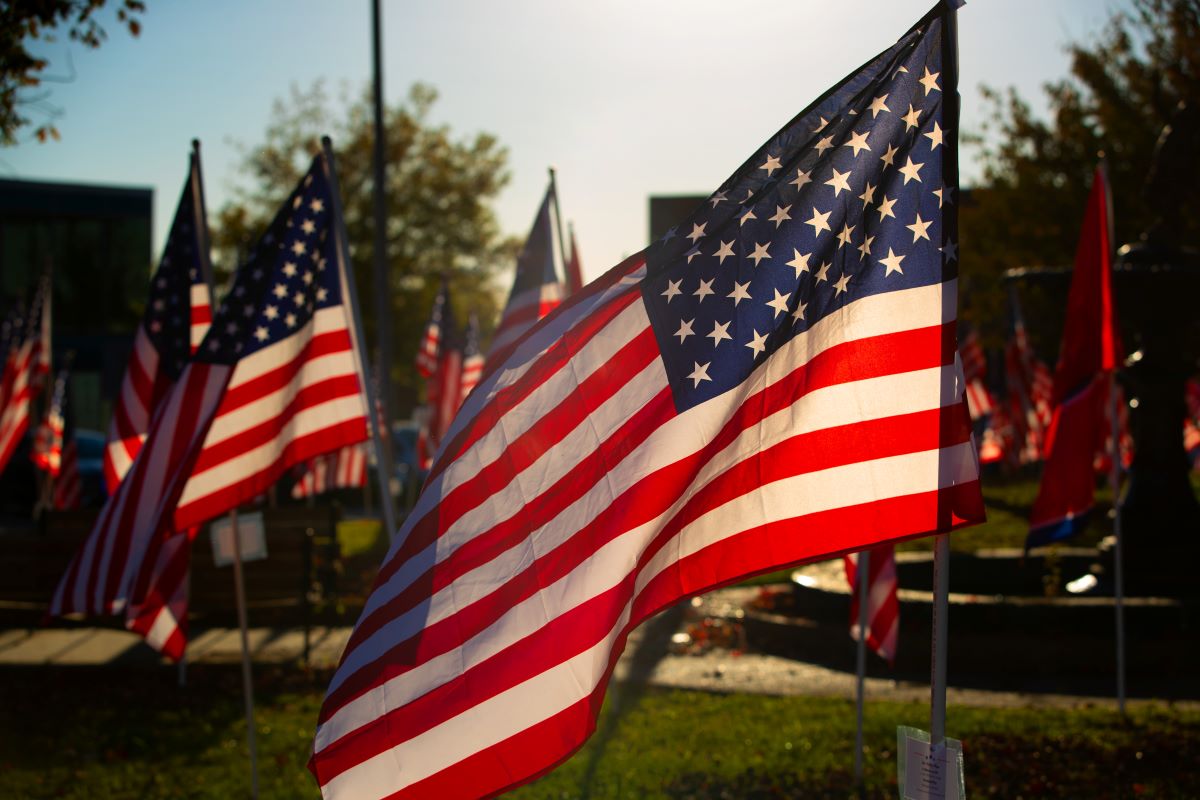 U.S. and Tennessee state flags fly outside the Haywood County Courthouse in Brownsville, Tenn. Courtesy of Mike Debose (UMNS).