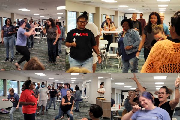 Staff sprint to be the champion of the spoon race.