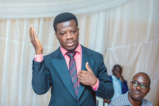 Prempeh Collins Kwasi, a United Methodist Board of Global Ministries special envoy, speaks at a five-day sign language training course for clergy and lay leaders held in the Rohero Parish in the Bujumbura District of Burundi. Kwasi, who is Deaf, helped coordinate the training. Photo by Rev. Niyiragira Ladislas, UM News.