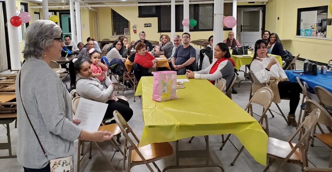 Rev. Lisa DePaz (left) with migrants and church members hosted at Haws Ave. UMC in Norristown, PA. Receipent of 2023 Mustard Seed Migration Grant. (Photo: Courtesy of Haws Ave. UMC)