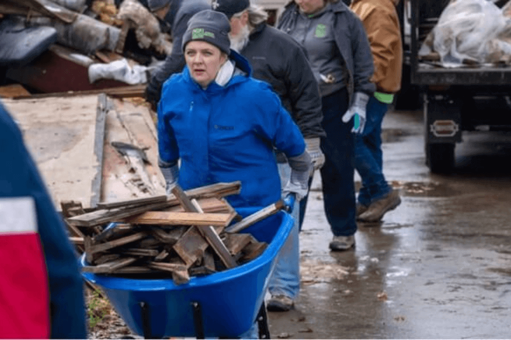 Katie Hills, UMCOR's director of Disaster Response, assesses the situation in Boone, NC, while pitching in with ERTs to clear debris from Valle Crucis UMC. (Photo: Ben Rogers, WNCC)