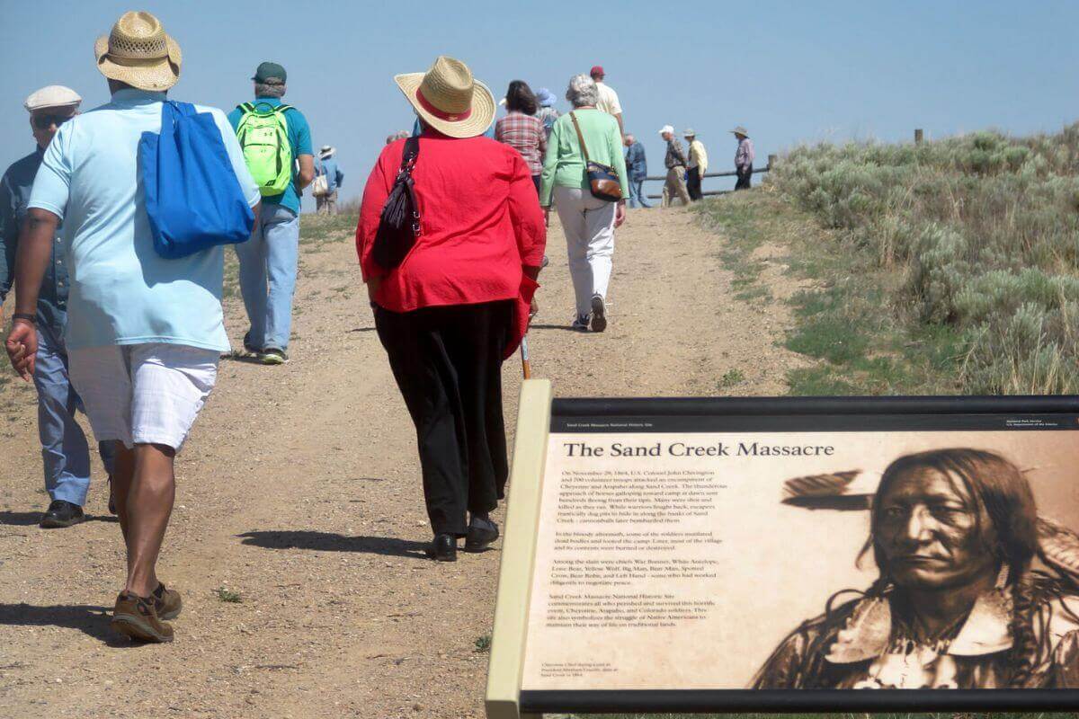 In this file photos from 2014, some 650 members of the Rocky Mountain Annual (regional) Conference (now Mountain Sky AC) and their guests tour the Sand Creek Massacre National Historic Site, near Eads, Colo., on Friday, June 20, 2014. A Methodist clergyman-turned-soldier ordered the 1864 attack against a Cheyenne and Arapaho village, and descendants of the survivors joined in the June 20 pilgrimage. Photo by Sam Hodges, UMNS