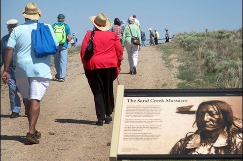 In this file photos from 2014, some 650 members of the Rocky Mountain Annual (regional) Conference (now Mountain Sky AC) and their guests tour the Sand Creek Massacre National Historic Site, near Eads, Colo., on Friday, June 20, 2014. A Methodist clergyman-turned-soldier ordered the 1864 attack against a Cheyenne and Arapaho village, and descendants of the survivors joined in the June 20 pilgrimage. Photo by Sam Hodges, UMNS