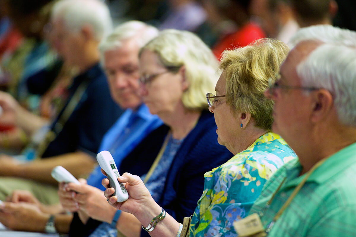 Members of the South Carolina Conference use electronic devices to cast their ballots during their annual meeting held in Florence, S.C., in 2015. File photo by Matt Brodie, South Carolina Conference.