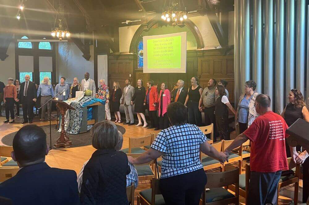 Joyful singing at the opening of the Center for LGBTQ+ United Methodist Heritage on Oct. 23, 2024, at Drew University. Photo by Crystal Caviness.