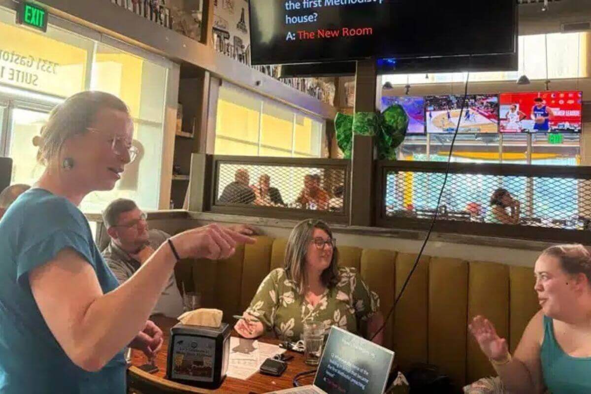 Dr. Ashley Boggan, General Secretary of the General Commission of Archives and History, leads a Methodist pub quiz during the UMCMA Summer Institute in July. Photo by Philip Wingeier-Rayo