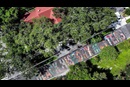 Vista aérea feita por um drone do mural "Black History Matters" em frente ao Museu Afro-Americano Woodson da Flórida, na 9ª Avenida S, 2240, na quinta-feira, 31 de julho de 2025, em São Petersburgo. Autoridades estaduais e federais de transporte estão ordenando que as cidades removam os murais de faixas de pedestres, alegando problemas de segurança. ©Dirk Shadd© Tampa Bay Times