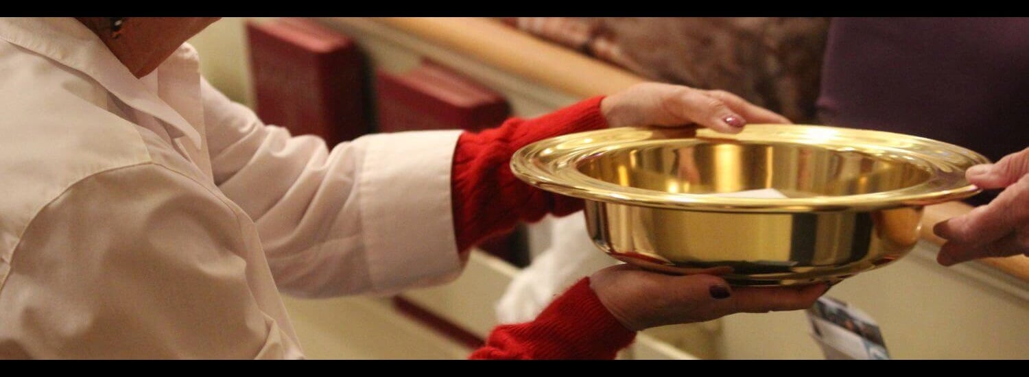 The offering plate is passed at Boise UMC The offering plate is passed at Boise UMC