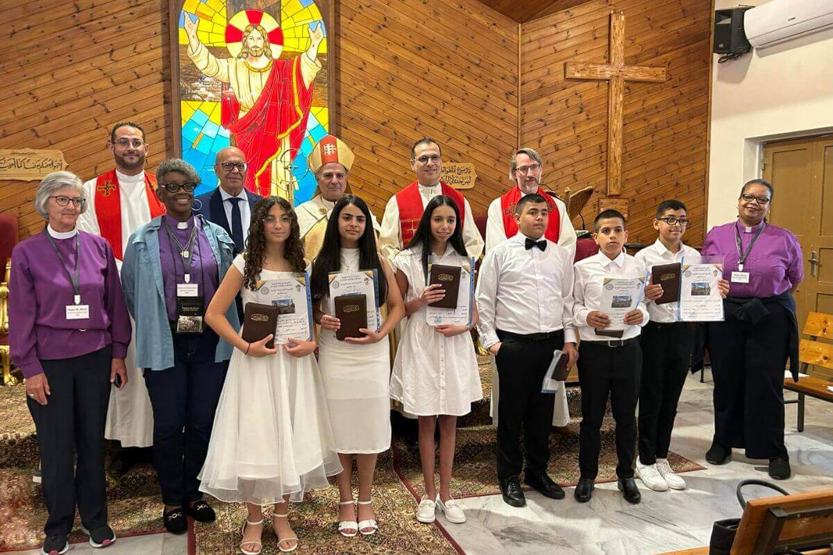 Bishops of the United Methodist Church with pastors of the Evangelical Lutheran Church of Beit Sahour, East Jerusalem, and a class of youth joining the church. Photo courtesy of Jin Yang Kim.