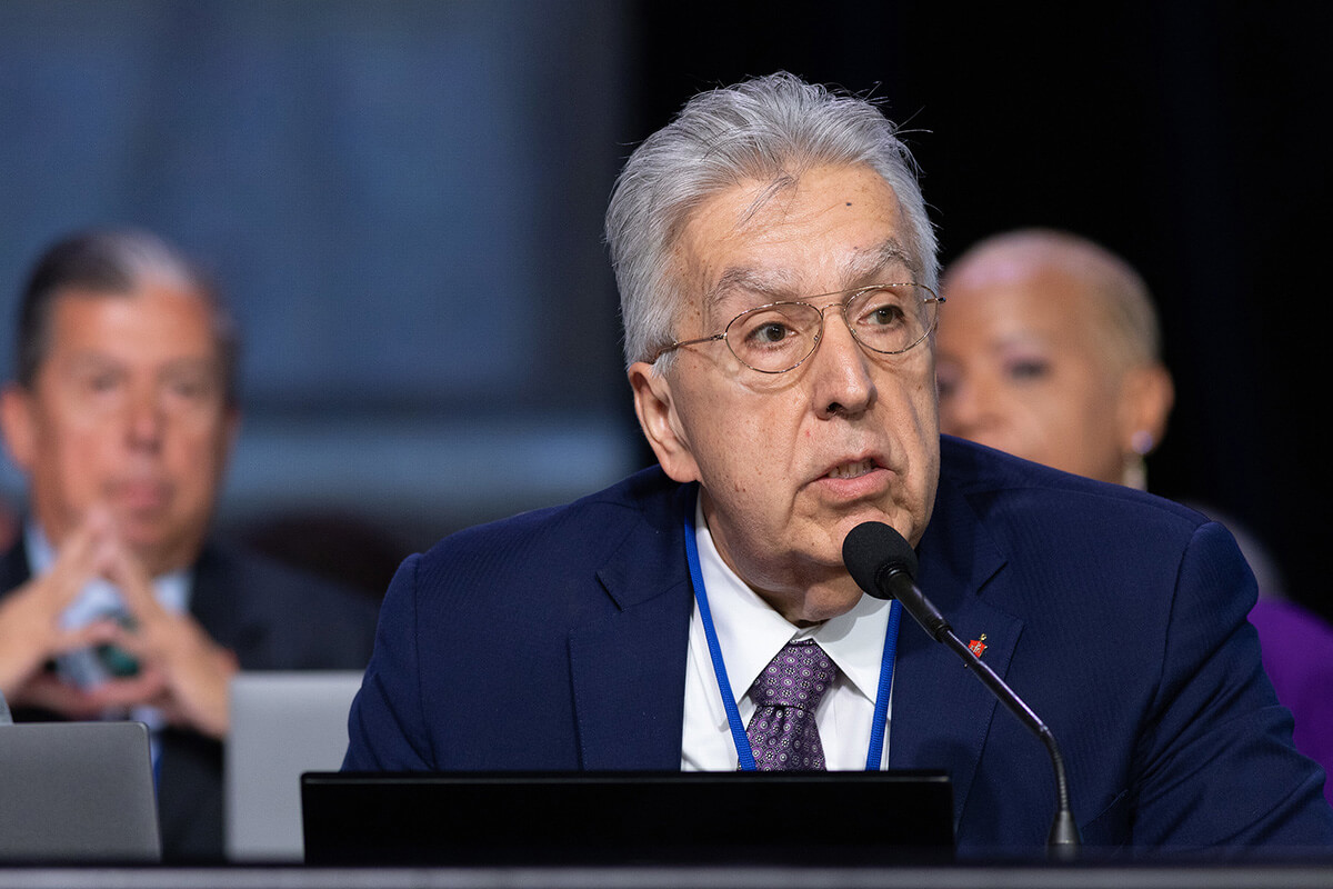 Bishop Ruben Saenz Jr., presides over a session of the 2024 United Methodist General Conference in Charlotte, N.C. Saenz, who leads the Horizon Texas Conference, is co-convener of the design team for this October’s Leadership Gathering. He and other organizers hope to engage all United Methodist in the gathering through a survey and through webinars scheduled January through March. File photo by Mike DuBose, UM News.