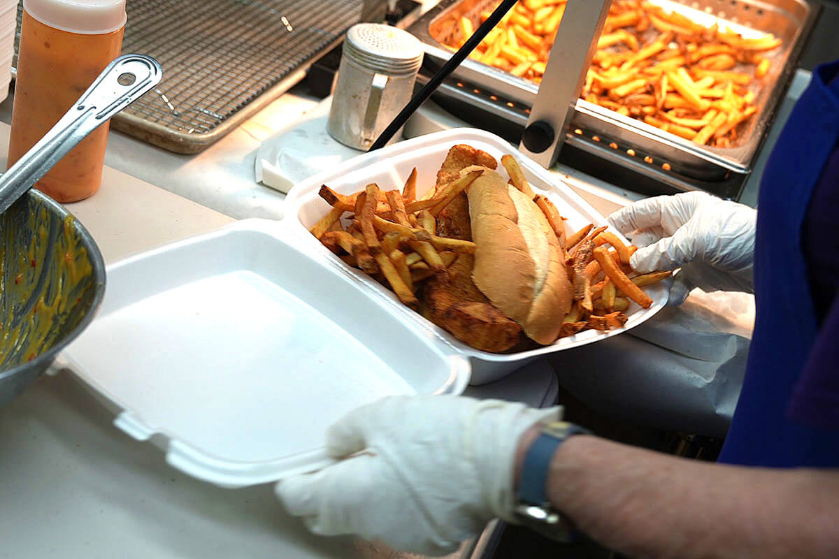 Christ United Methodist Church in Bethel Park, Pa., serves fried fish sandwiches on Feb. 27 during one of the church’s annual Lenten fish fries. The profit the church receives from selling thousands of $16 dinners goes toward feeding local unhoused people and supporting the fast-growing congregation. Photo by Jenn Morgan.