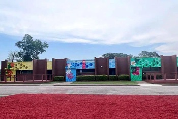 The Beacon Center, Montgomery, Alabama. The artwork on the building has the distinction of being the largest aerosol mural in the river region (spray paint). “We thought if it looked beautiful on the outside, then people would be expecting to be beautiful on the inside.” Rev. Richard WIlliams. Photo courtesy of Metropolitan UMC.