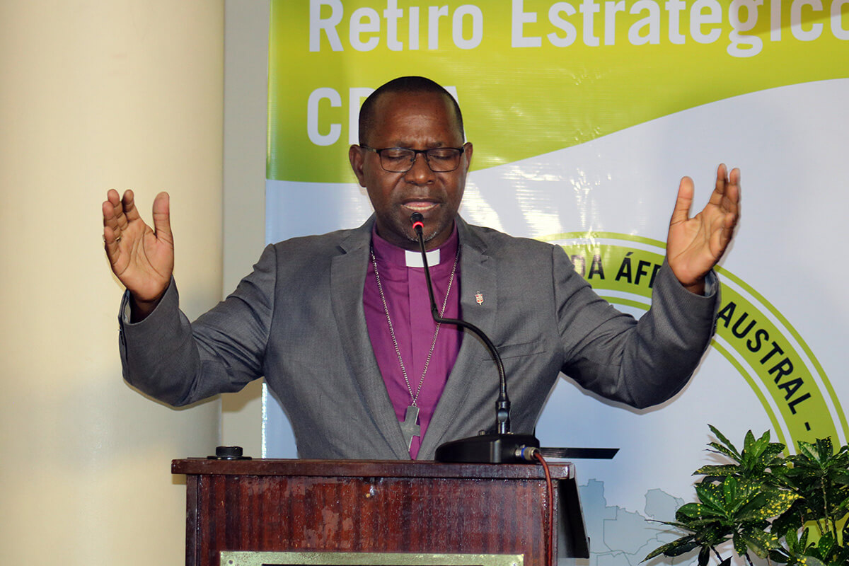 Bishop João Filimone Sambo prays during the Southern Africa Regional Conference’s strategic retreat held April 9-11 in Maputo, Mozambique. Sambo was the host bishop for the gathering. Delegates at the retreat crafted a roadmap for contextualized mission and ministry in Southern Africa. Photo by Roque Facela, UM News. 