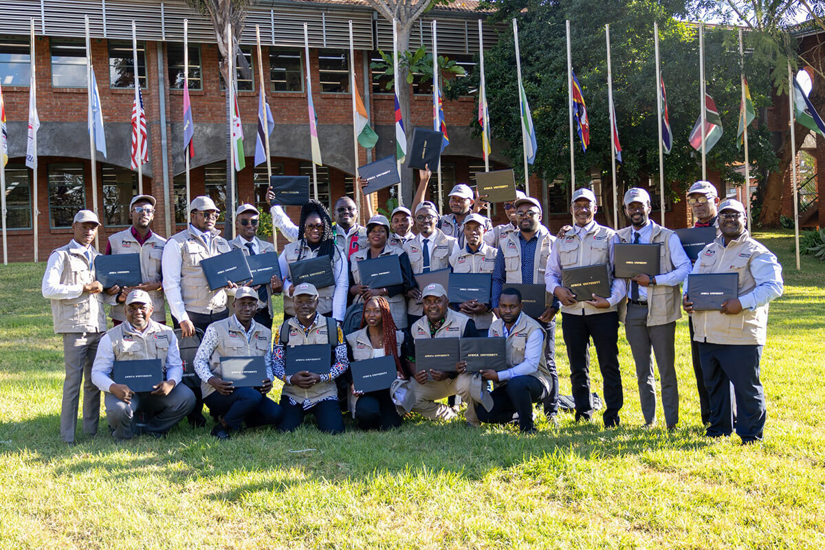 Graduates of a new strategic communications program hold their certificates following a June 26 graduation ceremony at Africa University in Mutare, Zimbabwe. The group represented the first of two cohorts of United Methodist communicators trained to strengthen the church’s media network across the continent in the face of crises, epidemics and misinformation. The program is a partnership between Africa University and United Methodist Communications. Photo courtesy of Africa University.